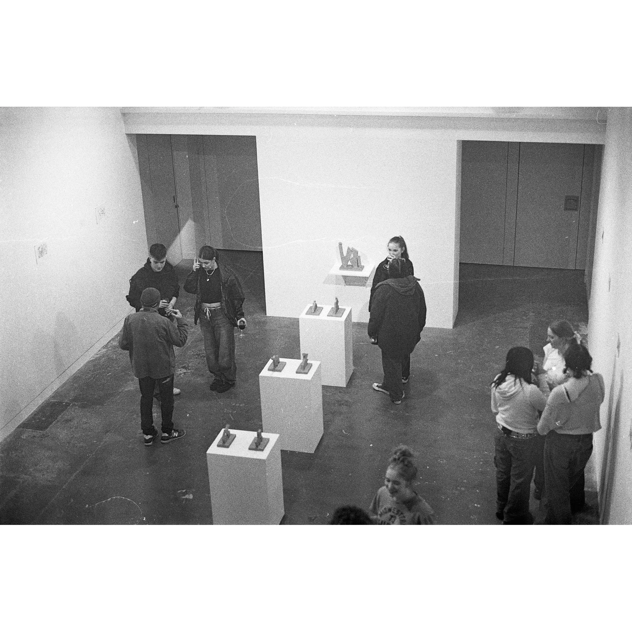 Photograph of the private view of 'Izatt Shortman, Harry Wilkins' at Michael Pennie Gallery, Bath, 2024. © Jakub Knap, 2024