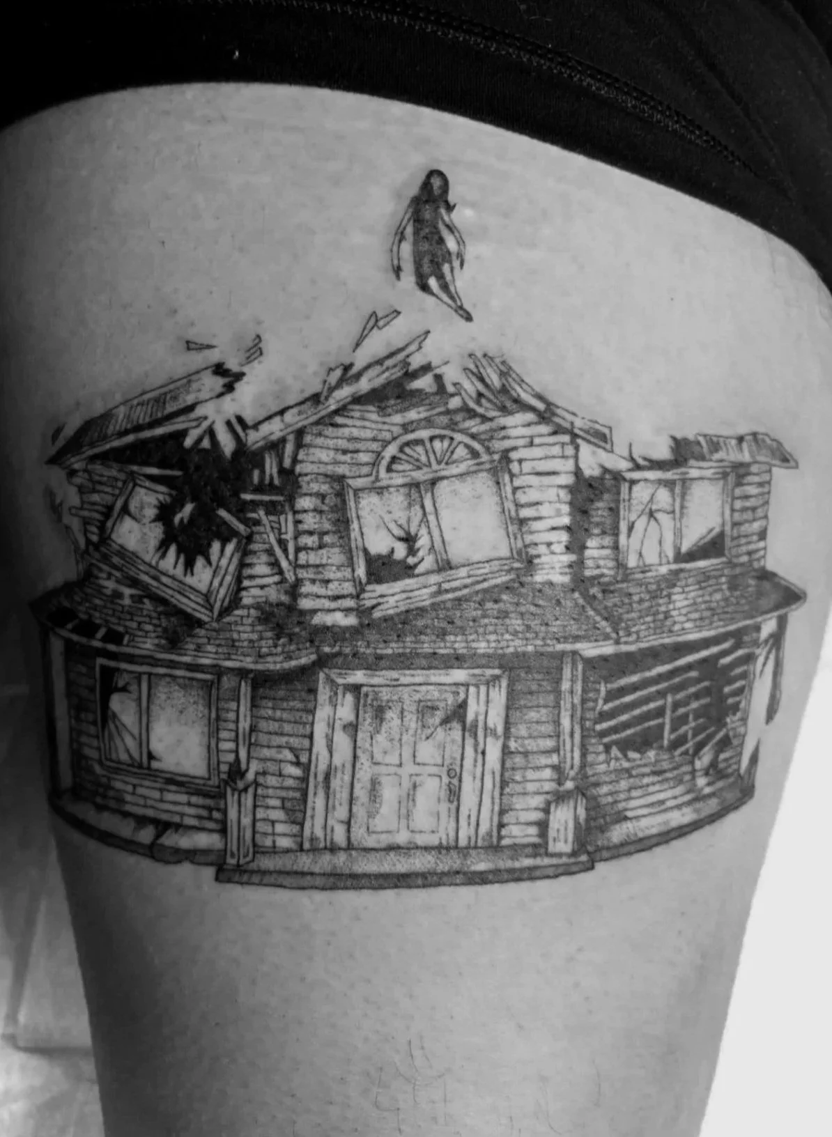 Girl destructed house tattoo