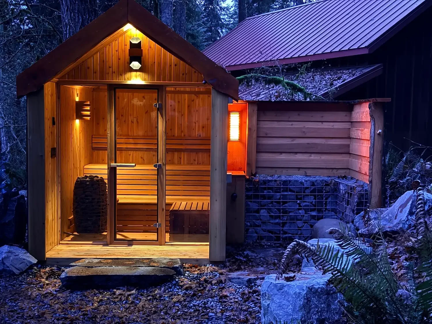 Cedar-lined sauna at Fjellsangin with Harvia heater stones — contrast therapy cabin near Mt. Rainier