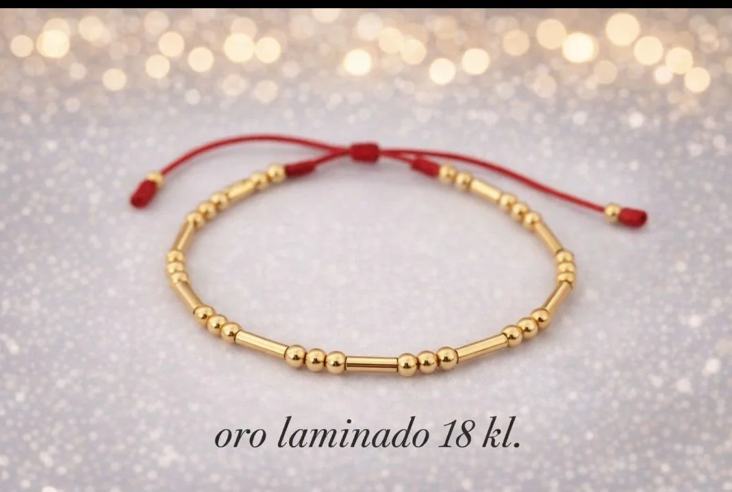 Pulsera Tejida con Perlas Cilíndricas Doradas
