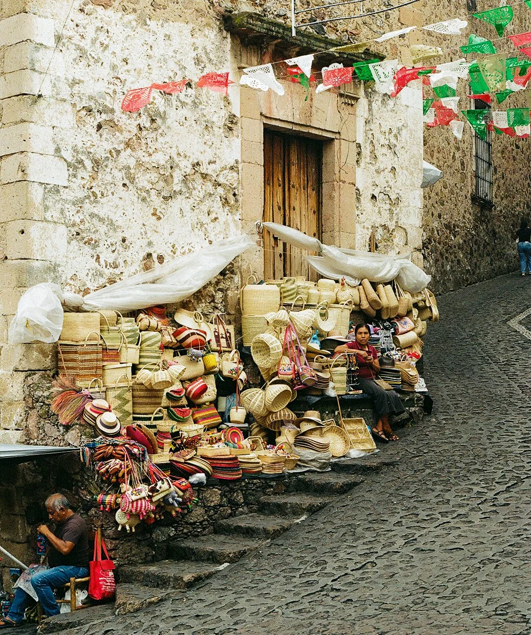 Basket saleswoman in Taxco, Guerrero, Mexico