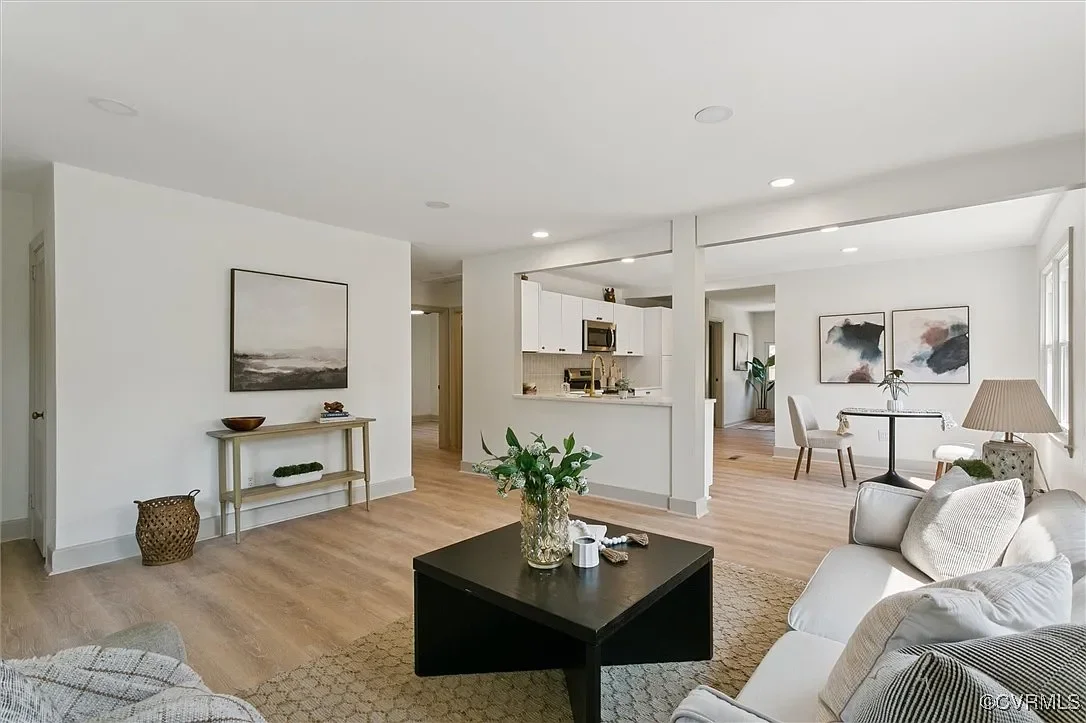 Staged minimalist living room showcasing JDK Strategic Solutions' commitment to modern design and high-quality real estate development.