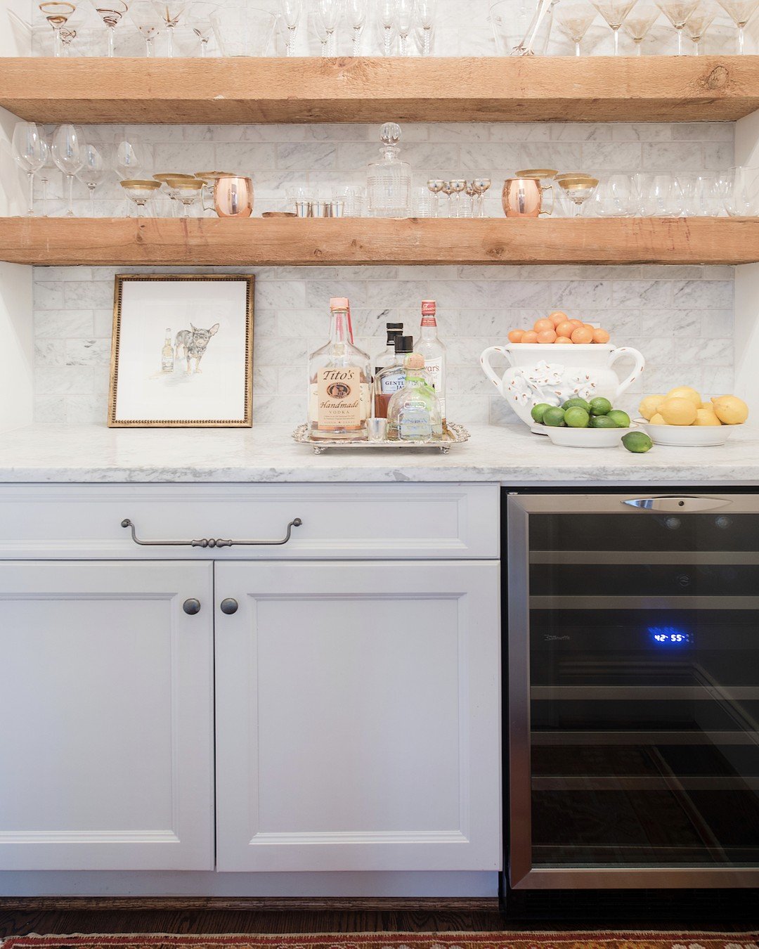 Proof that even the smallest spaces can make a statement. 🥂

Custom cedar shelving adds warmth and character, while layered styling transforms this bar from purely practical to beautifully personal. Fresh fruit, collected glassware, and a commission
