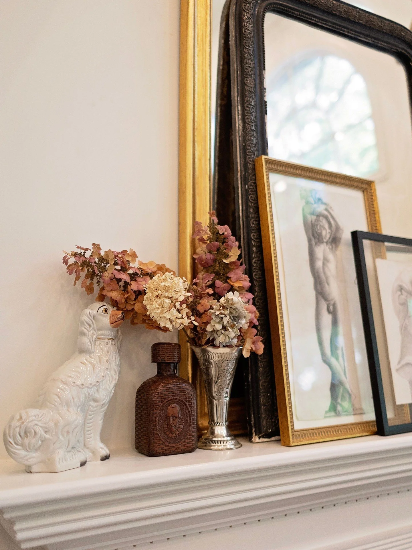 Styling should feel personal, layered, and collected over time. 🕰️

The most meaningful spaces evolve with your life, your collections, your mood, and the places that inspire you.

This mantel layers antique Louis Phillips mirrors as well as delicat
