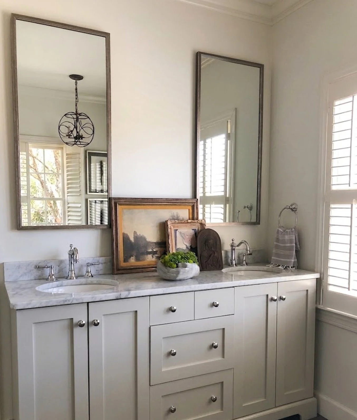 This is where we started&hellip; and let&rsquo;s just say the cultured marble had a very different story to tell!

With a few thoughtful updates, this bathroom was transformed. Chrome plumbing fixtures (still a favorite in any bath), an iron pendant 