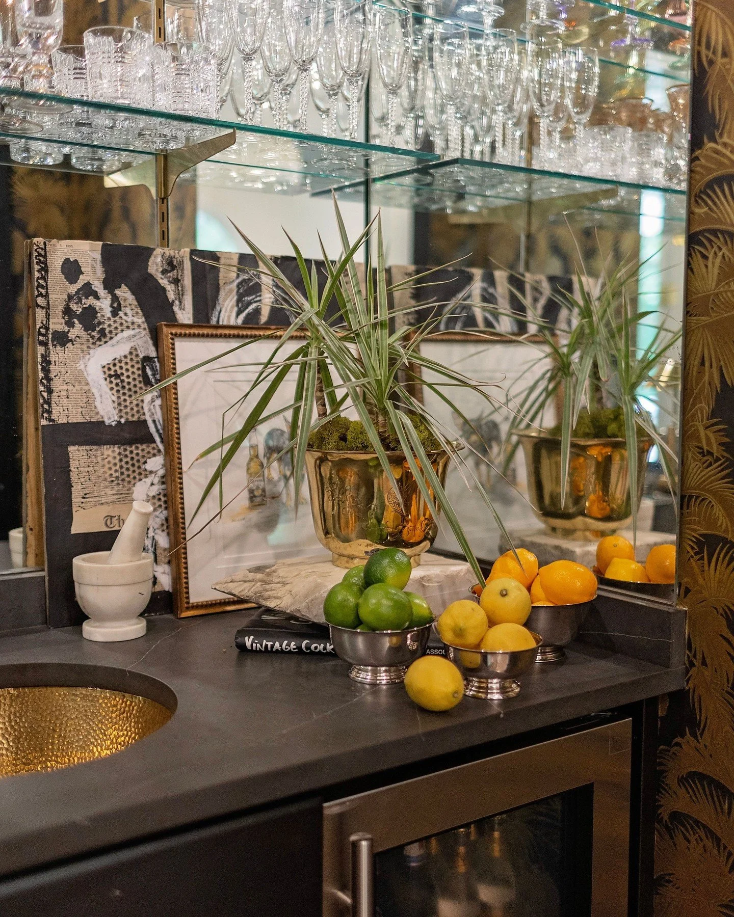 A bar is the perfect place to go a little wild: bold paper, something unexpected. It's the one room where young and old, maximalist and minimalist, all find themselves daring enough to step out a bit.

This one went from plain and dated to moody and 