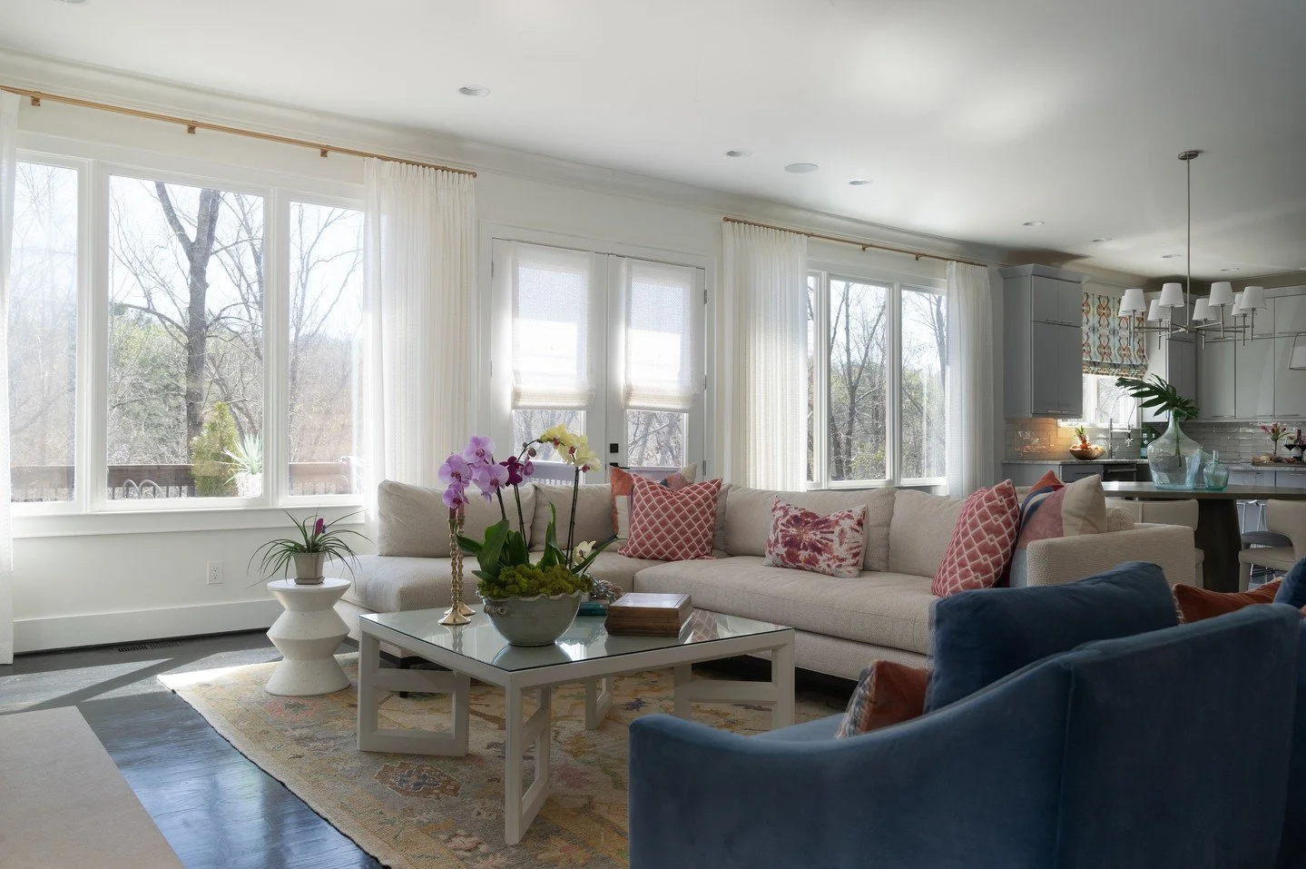 Sheer window treatments were the move here, letting the light pour in while still keeping things feeling casual and pulled together. Gold matte traverse rods let the drapery glide open or shut in seconds, fully operable to cover the whole window.

On