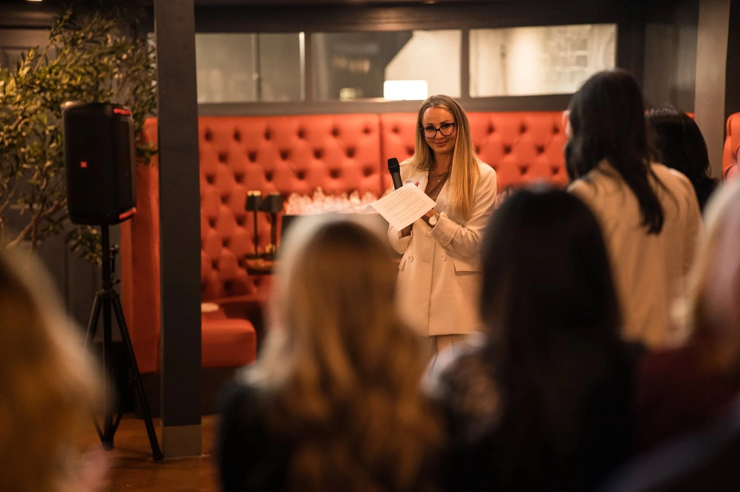 Amanda Eastwick, SIOR, CCIM WILDCard Event, speaking to a room full of women about industrial, logistics, and development. Leadership in action. Hosted event in Reno, Nevada