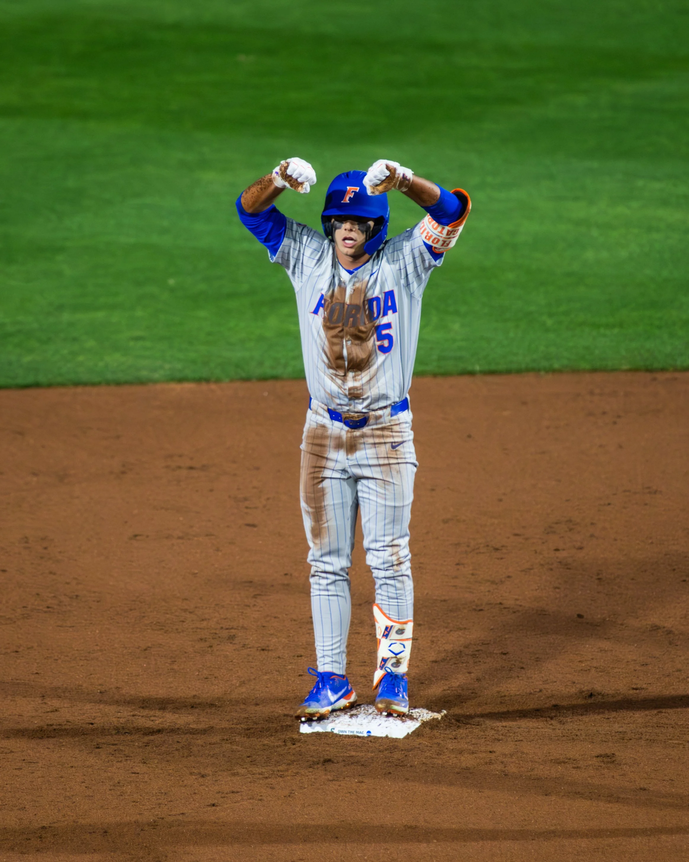 Chomp Chomp - Blake Cyr celebrates to the dugout after stealing 2nd base against Stetson.