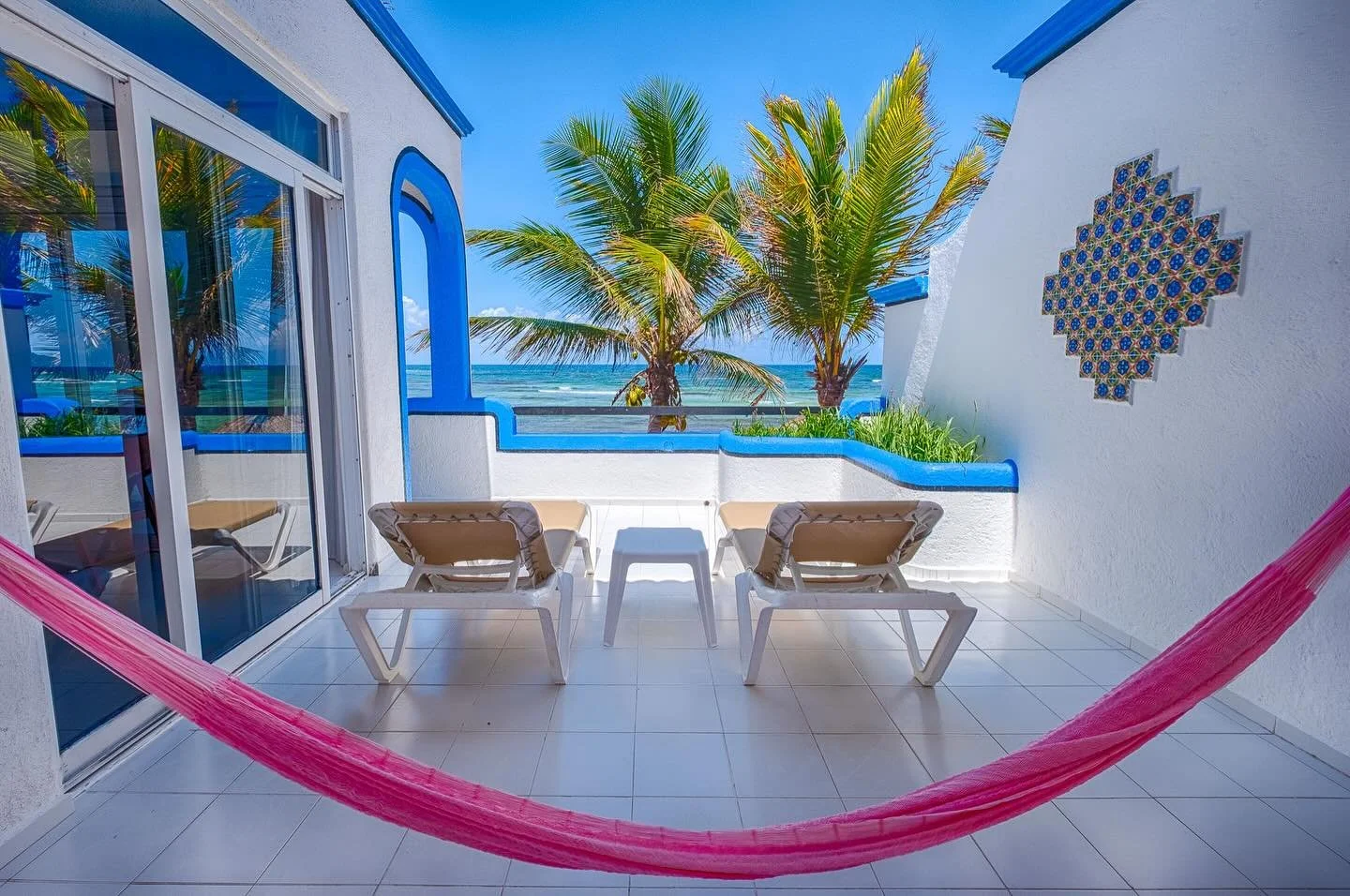 ☎️ your private balcony called&mdash; it said bring a book, lose the shoes, and cancel your plans. 

🌴 because when the view looks like this, your only job is to rotate between the hammock and the lounge chair. 🍹

#delsolbeachfront #rivieramaya #ak