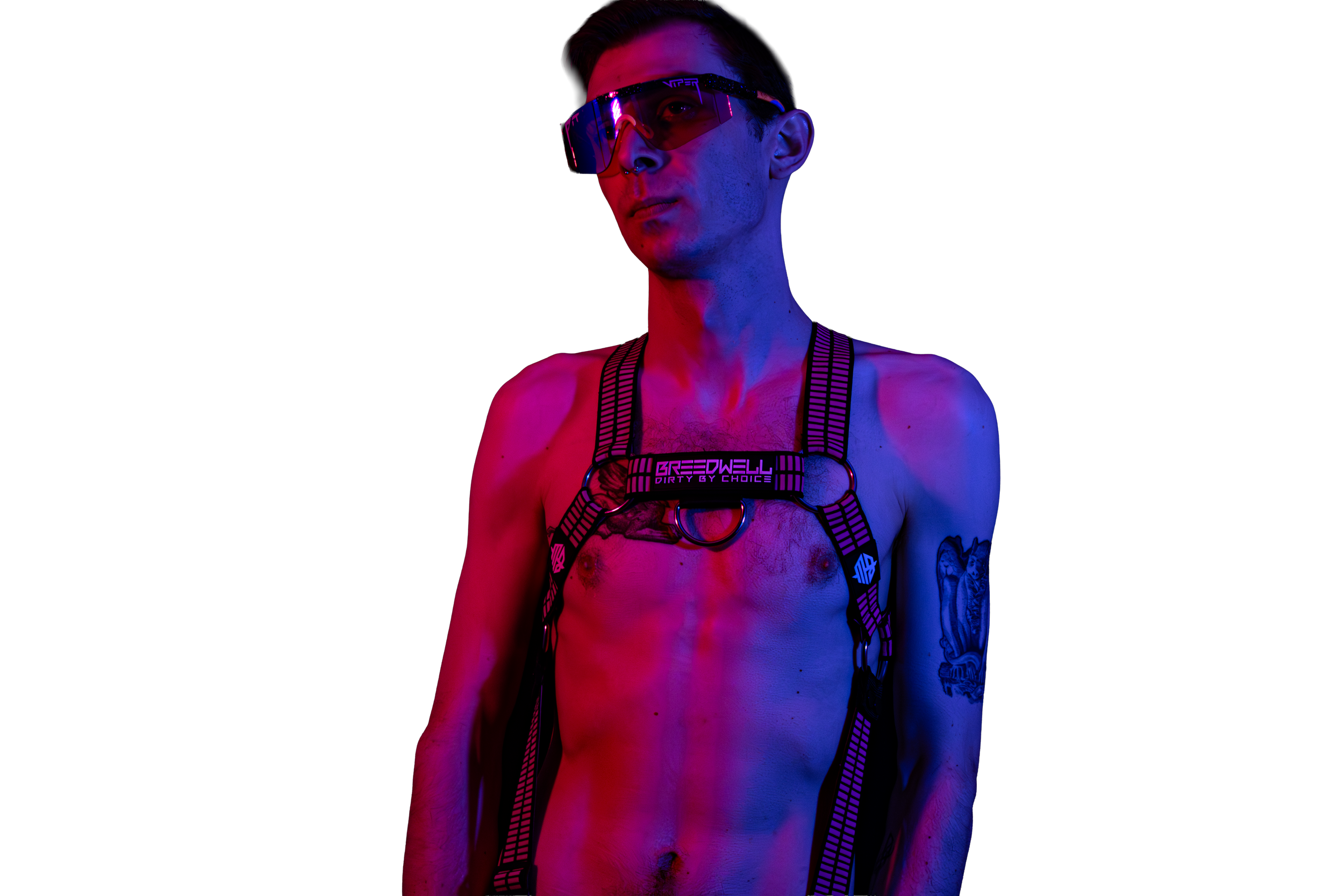 Man wearing a harness and sunglasses in red and blue lighting.