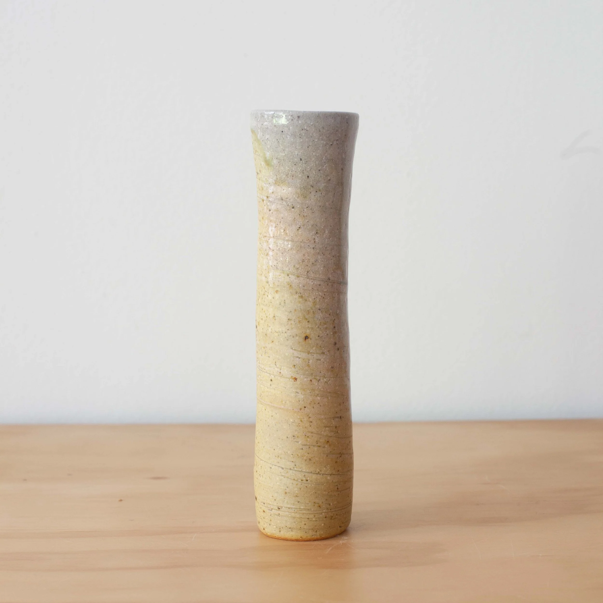 Small yellow slip vase