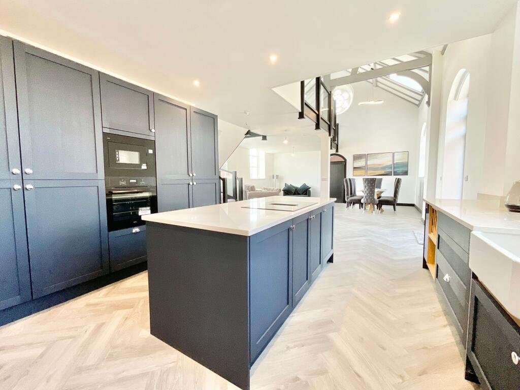 Contemporary kitchen with island at The Chapel luxury holiday home near Eccleshall