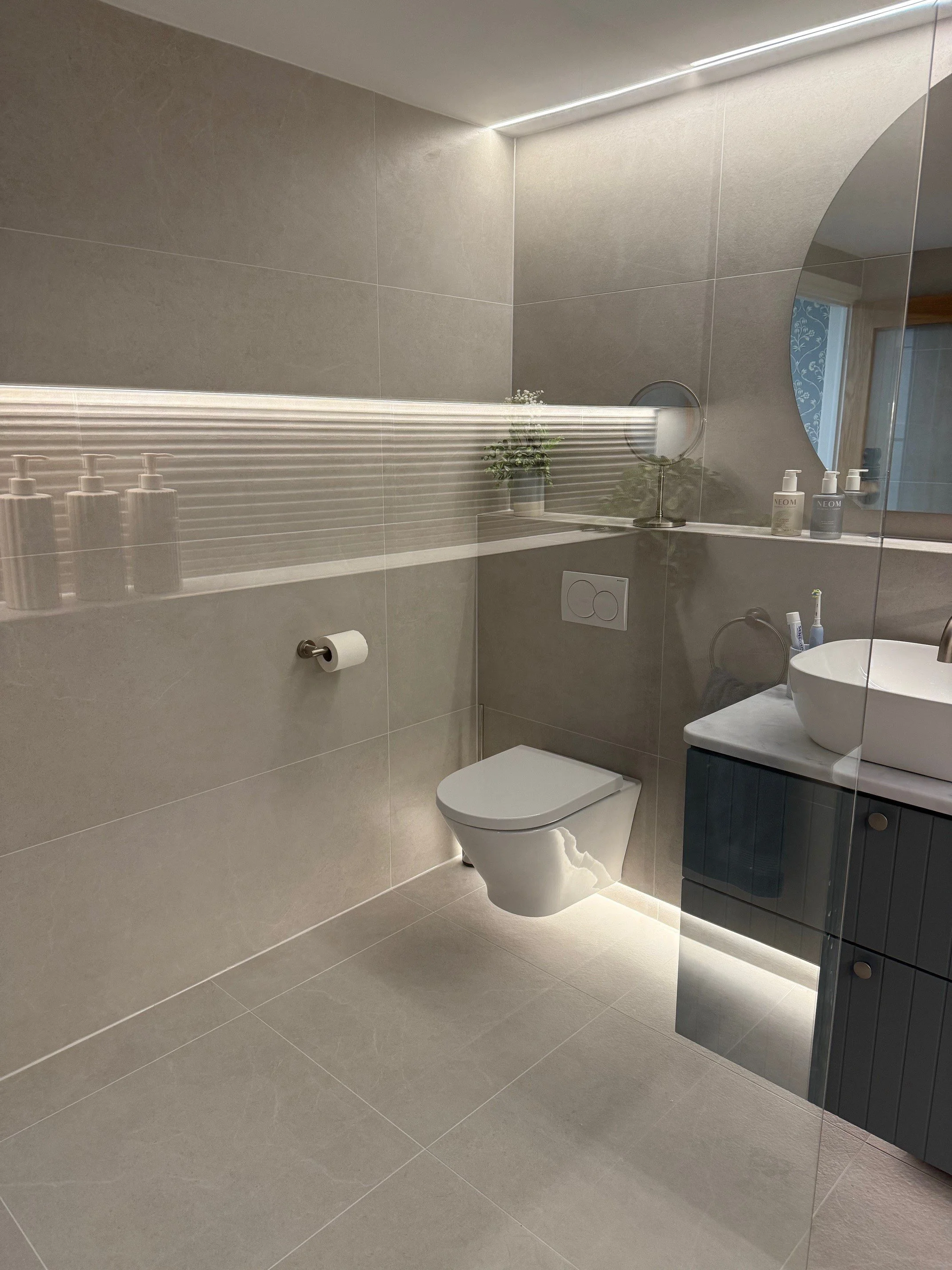 We added tonnes of secondary lighting- this is the midnight bathroom run toilet, so soft, floor level lighting is a must!
