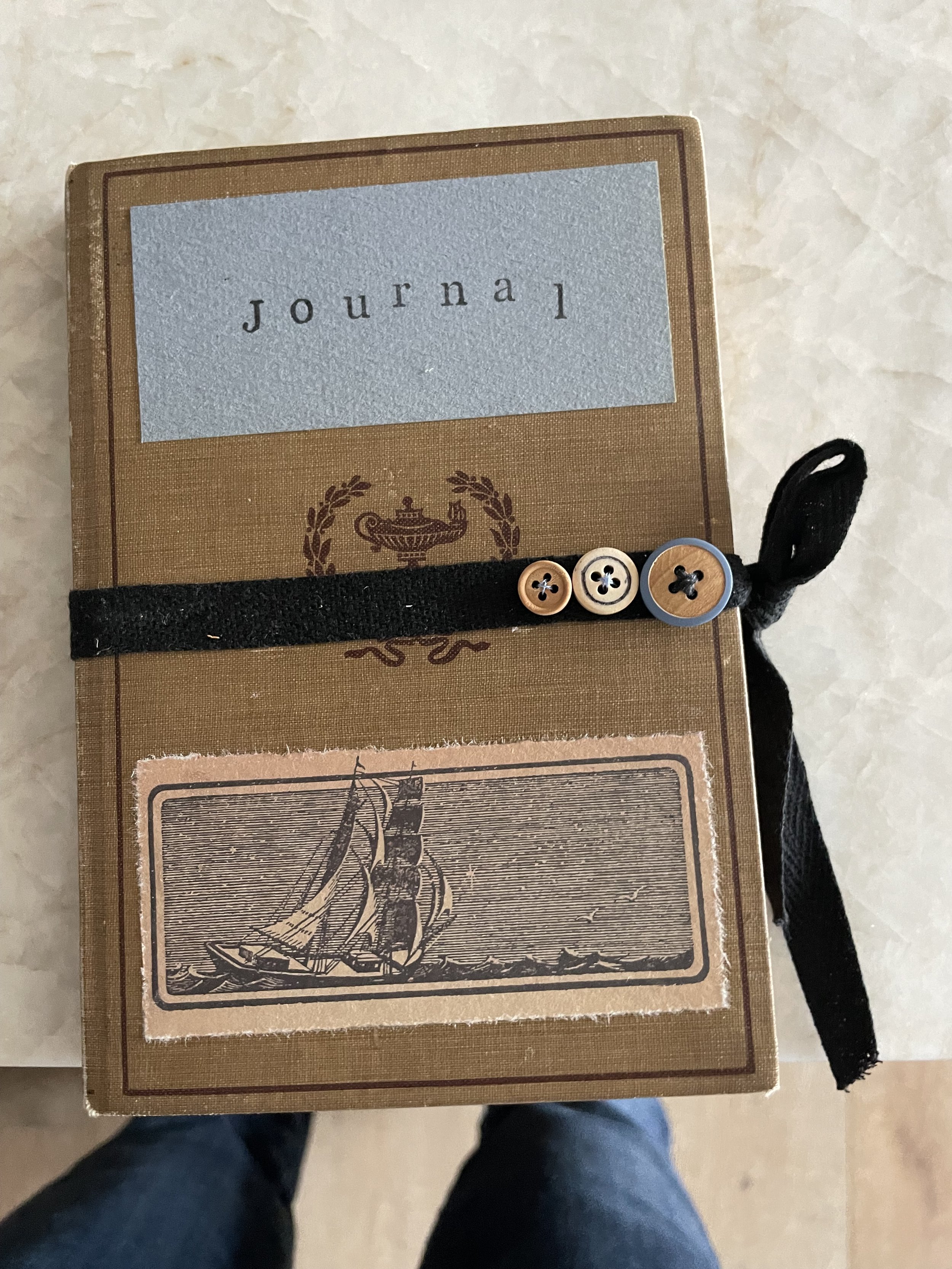 project: handmade journals from old books - topic: tracking your thoughts in order to grow