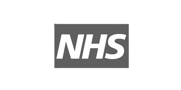 Close-up of a sign with the NHS logo, symbolizing the National Health Service in the UK.