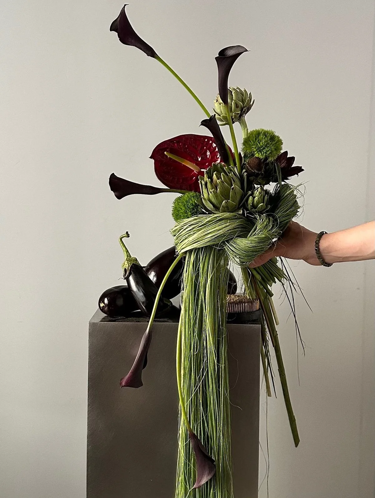 | Sculptural florals are quiet architecture. 
They shift the energy of a room instantly, adding height, tension and movement in ways no piece of furniture ever could. A single arrangement can soften hard lines or inject a cinematic sort of drama that