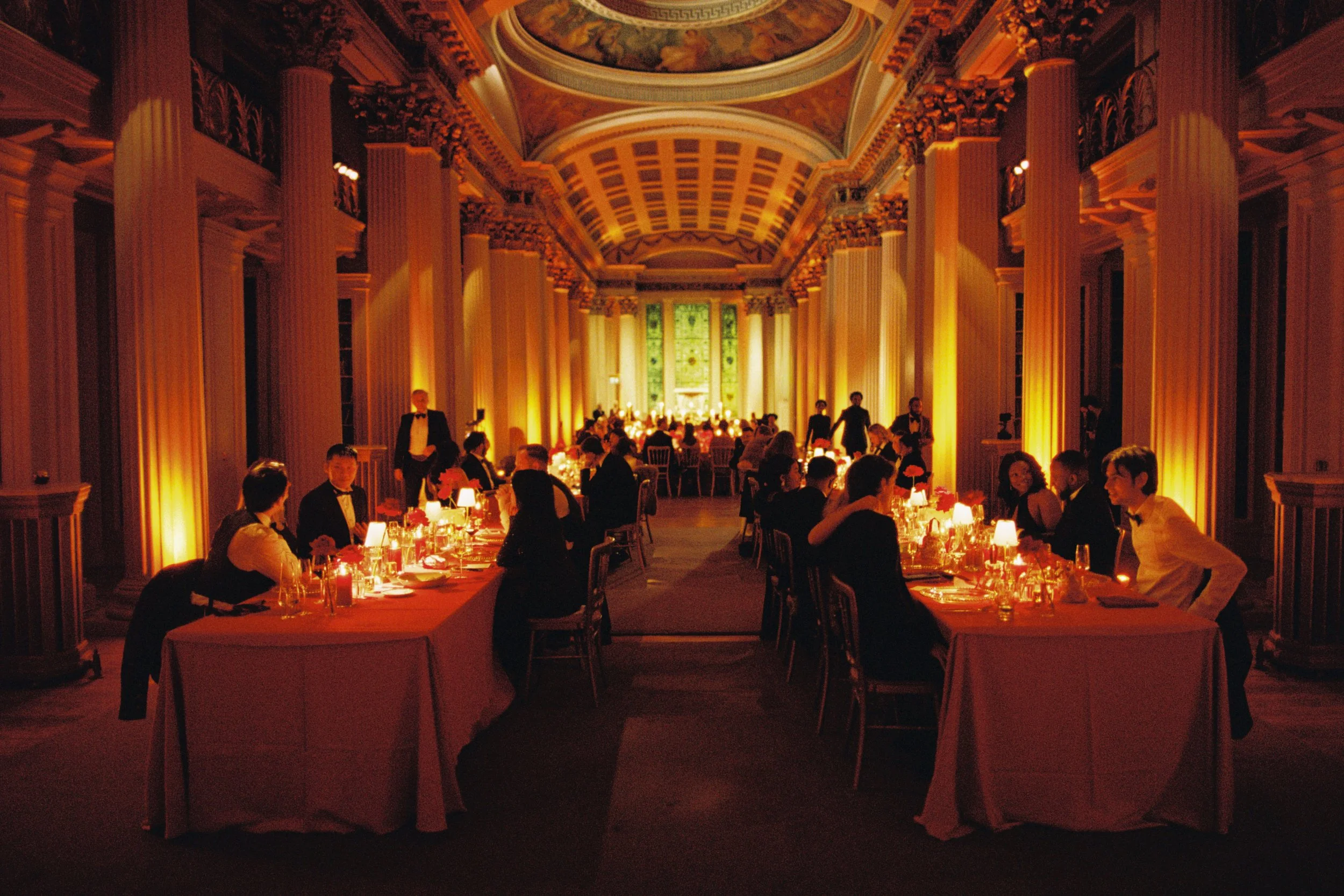 The Signet Library reception wedding long tables red decor Chinese wedding in Edinburgh Scotland Vogue Film photography
