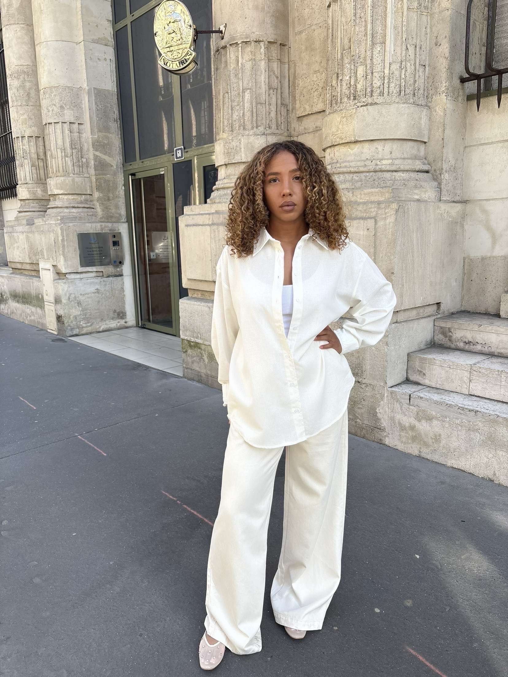 alt="Pantalon palazzo beige fluide taille haute femme Emna"
