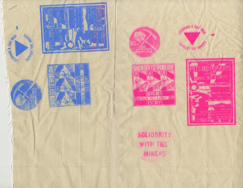 Screen printed badges from the LGSM campaign.