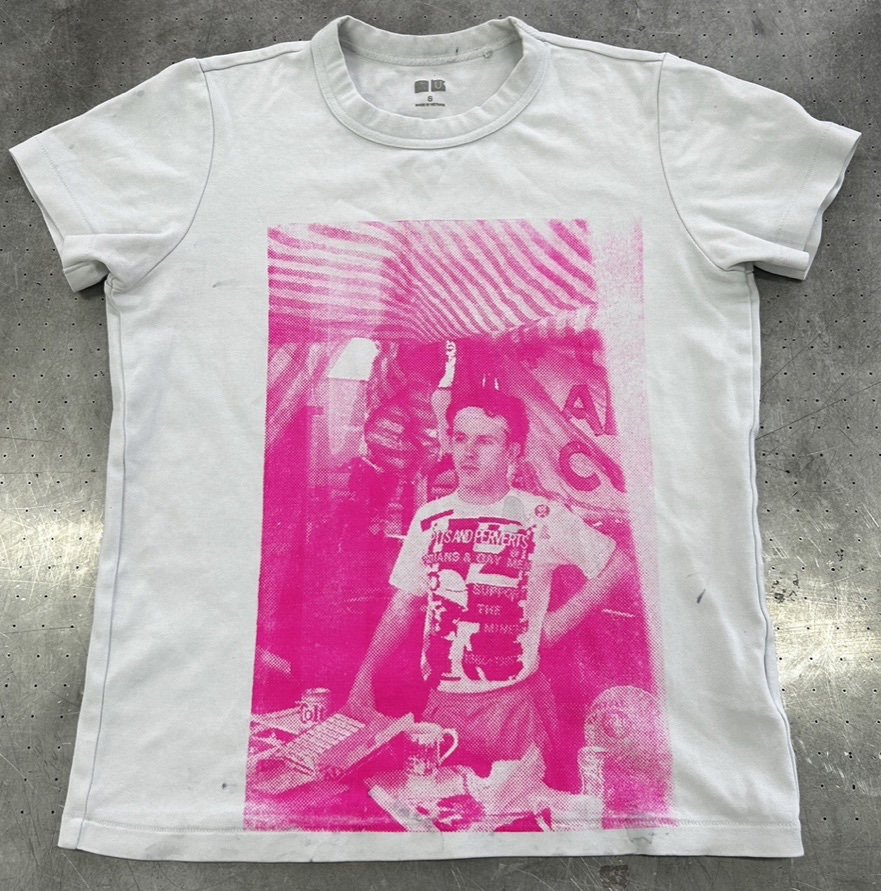 Image of Mark Ashton screen printed onto a t-shirt.