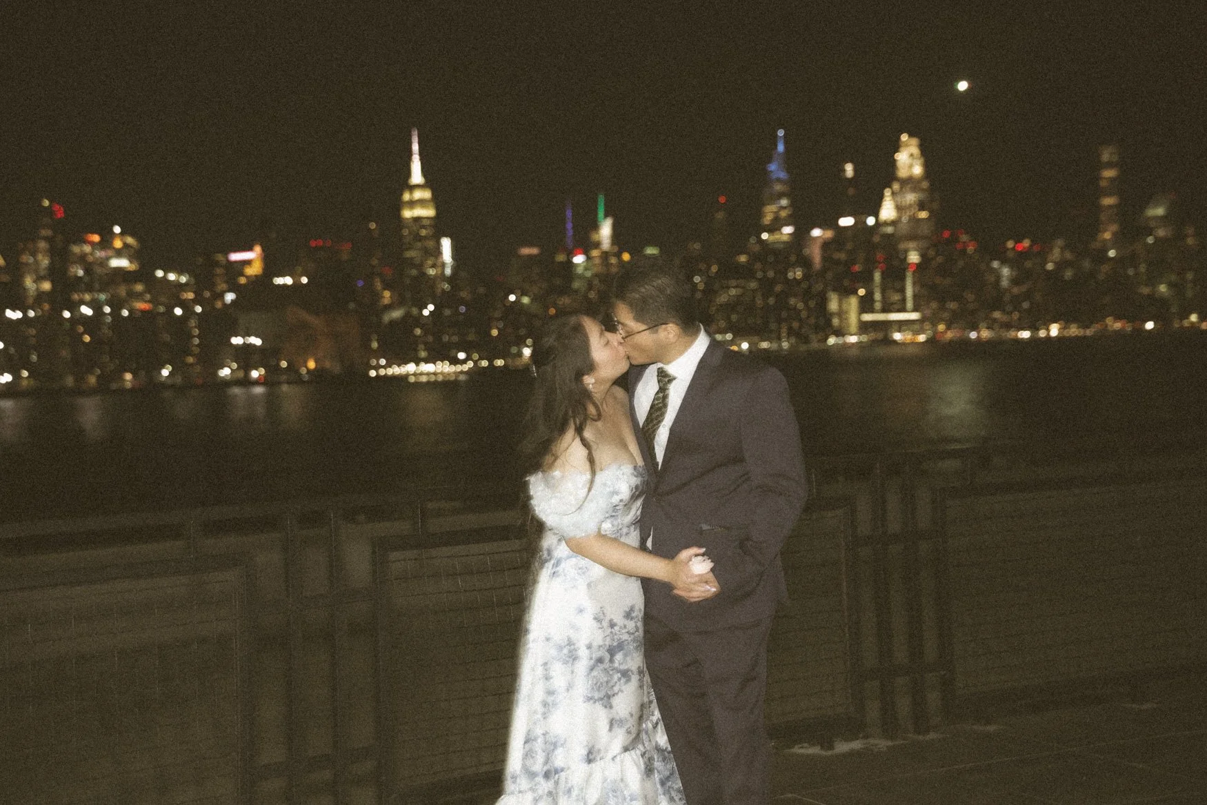 reception outfit change overlooking manhattan skyline, brooklyn rooftop wedding photographed in film