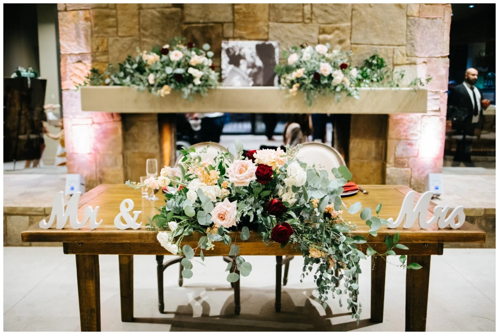 Galway Downs Temecula Wedding Sweetheart Table with Red, blush, cream, and eucalyptus colors