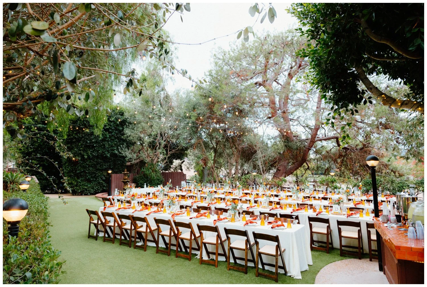 The old rancho estate reception table setup wide shot