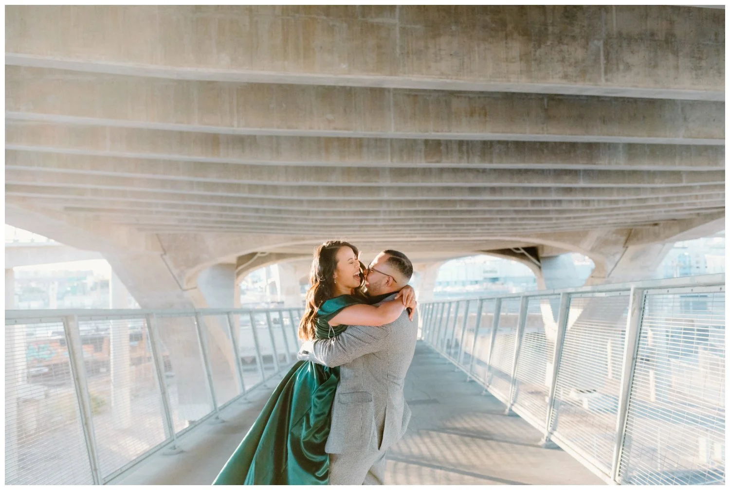 cinematic engagement photos at sunset by by evening photo and films, in downtown los angeles, ca