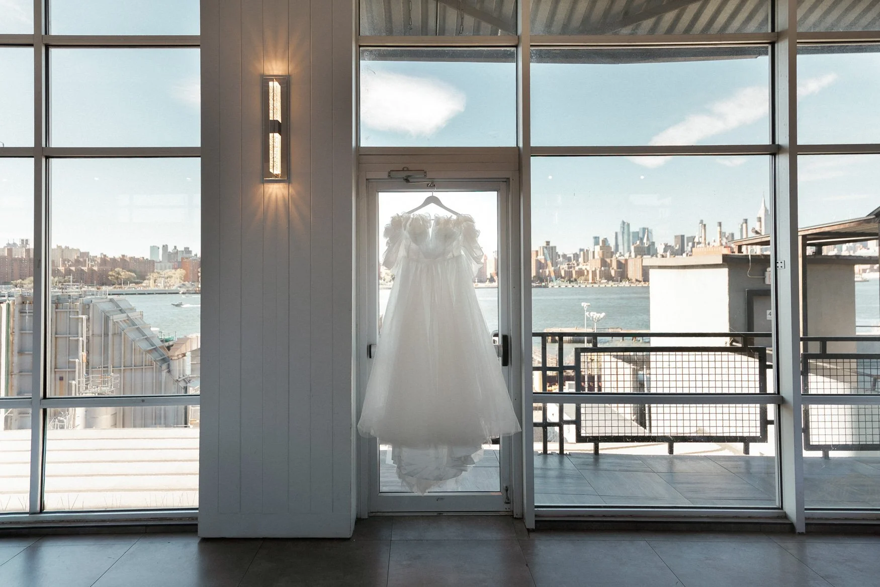 wedding dress detail photo overlooking manhattan skyline