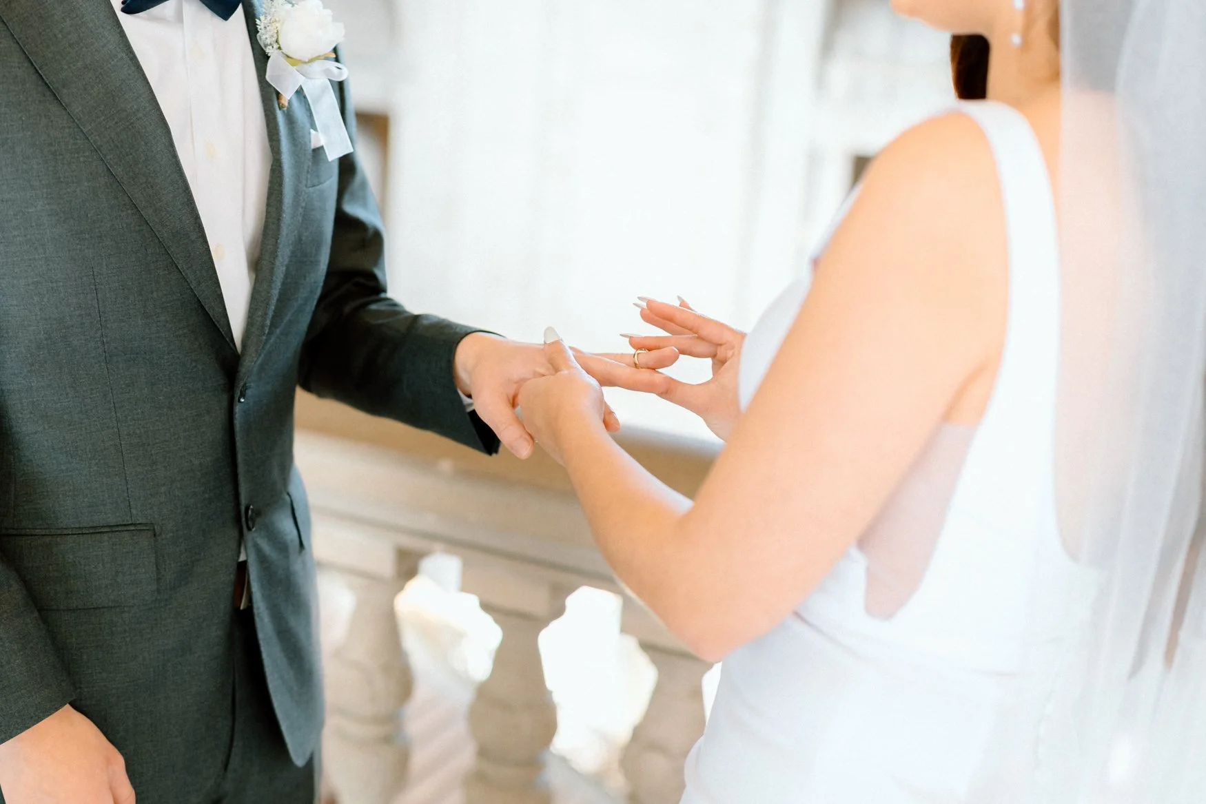Jonathan and Carla exchange rings underneath the iconic San Francisco City Hall dome