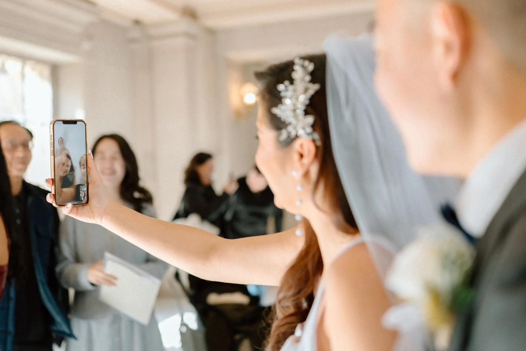 Bride facetimes her family in Brazil after saying "I Do" in San Francisco City Hall
