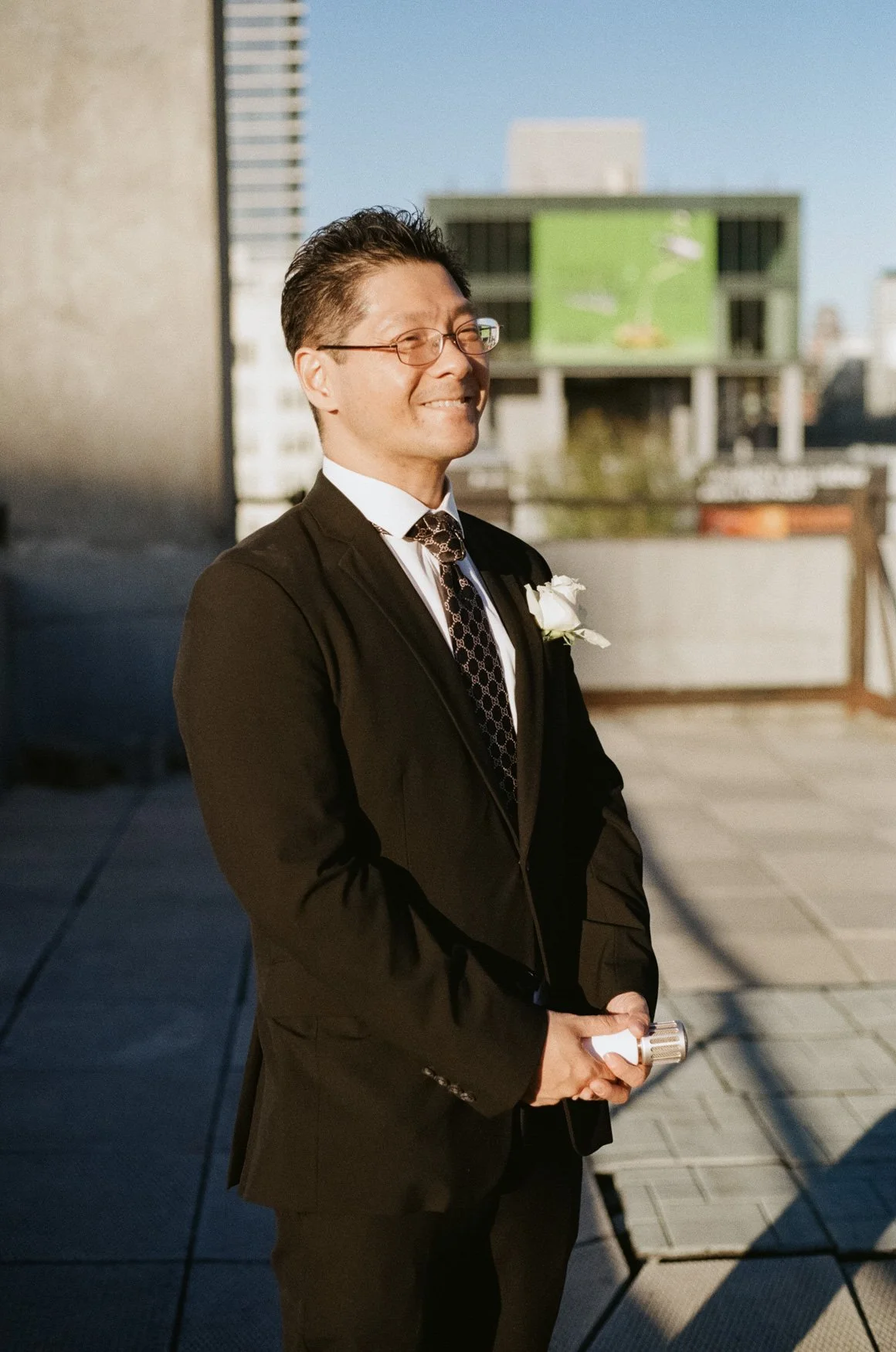 35mm film photo of groom seeing bride walk down the aisle, by evening photography new york wedding photographer