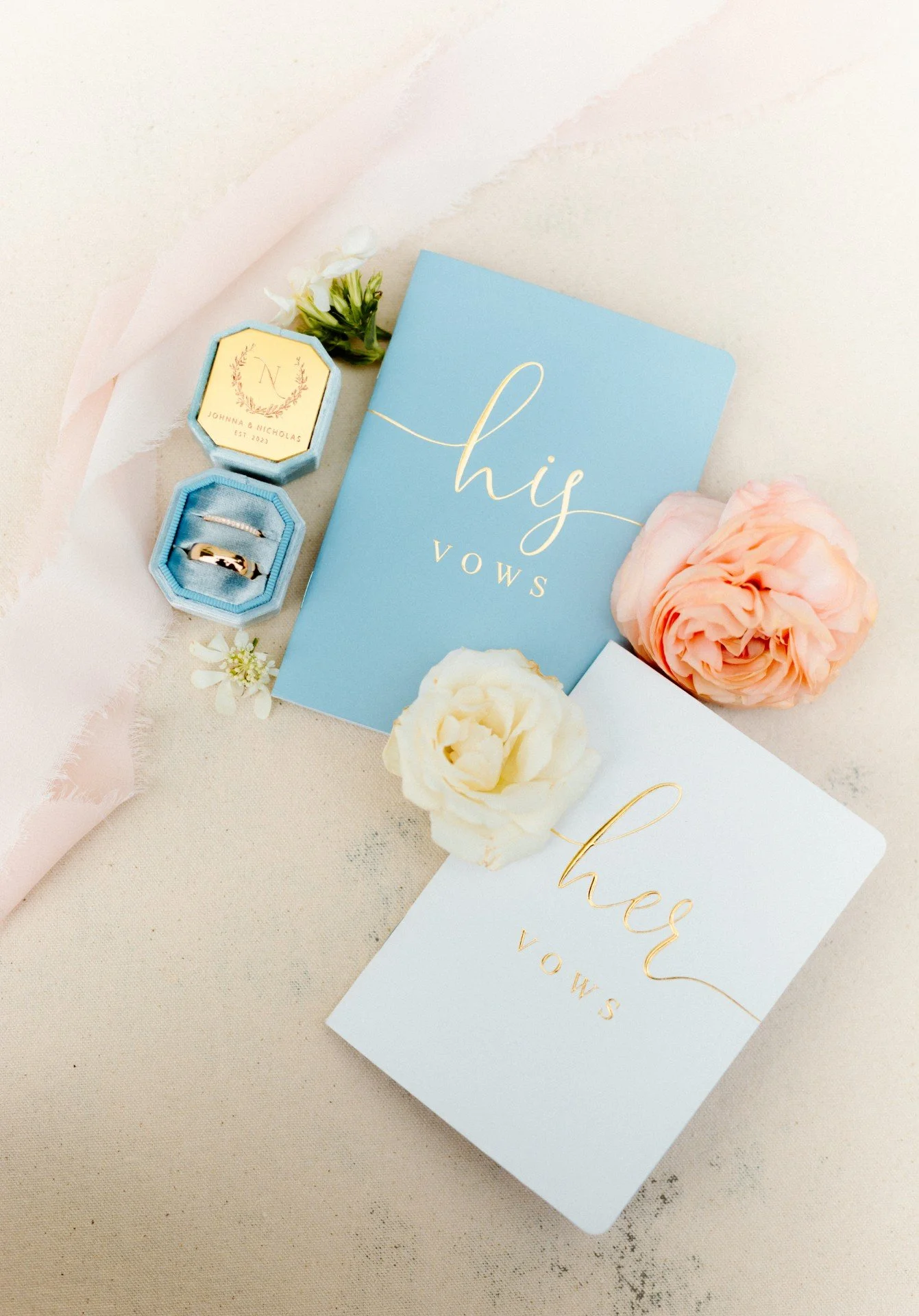 blue and blush flatlay wedding detail photo in costa mesa, ca at avenue of the arts