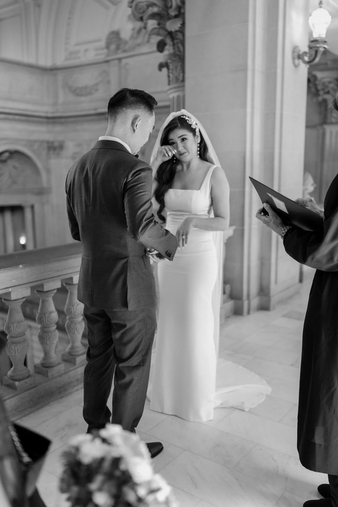 Bride cries after exchanging vows in SF City Hall, emotional wedding photos by By Evening Photo and Films