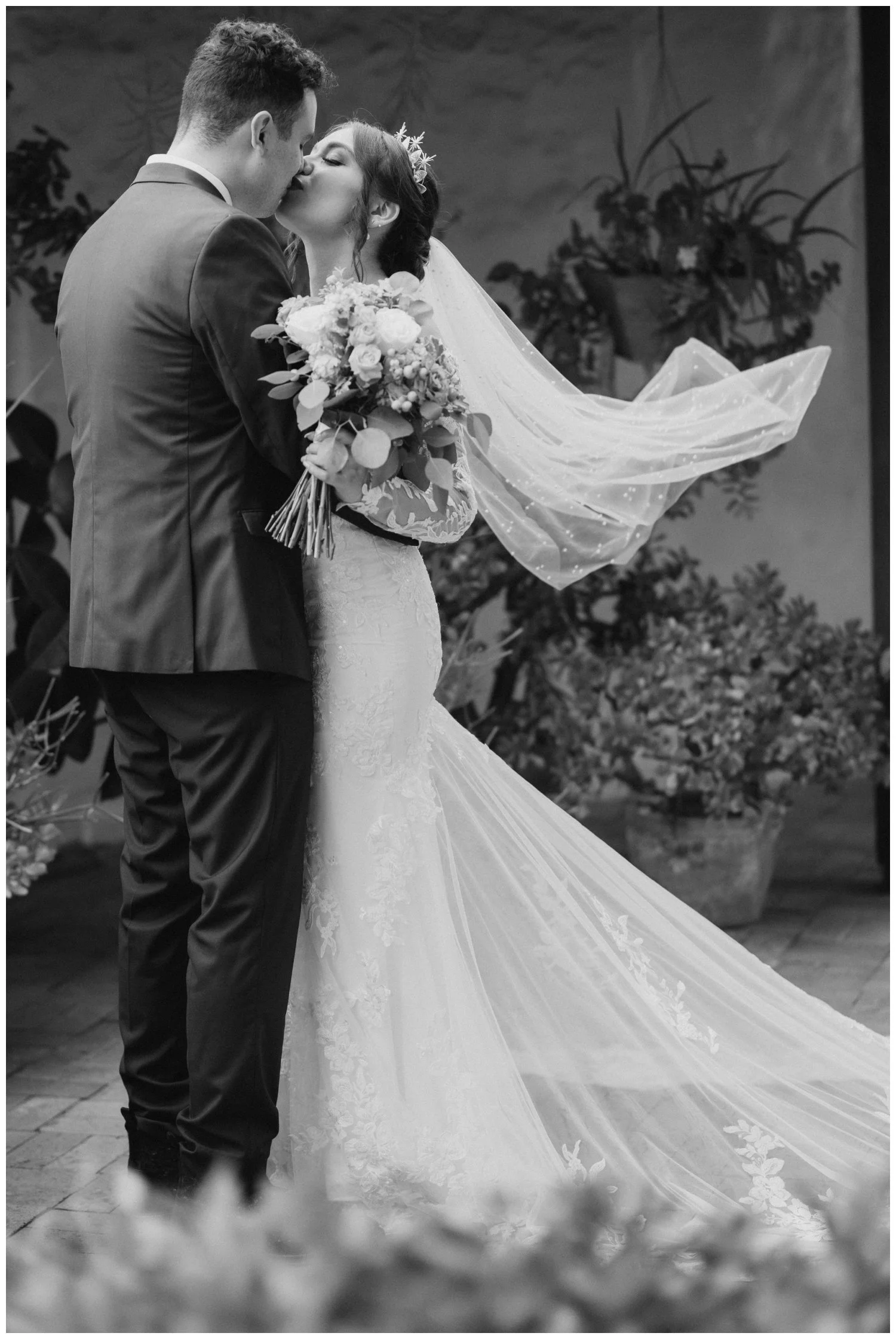 Flying veil photo with Belen and Ross Kiss, documentary and editorial wedding photos by By Evening Photography