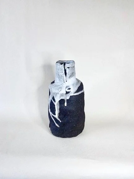 black bottle poured slip.jpg