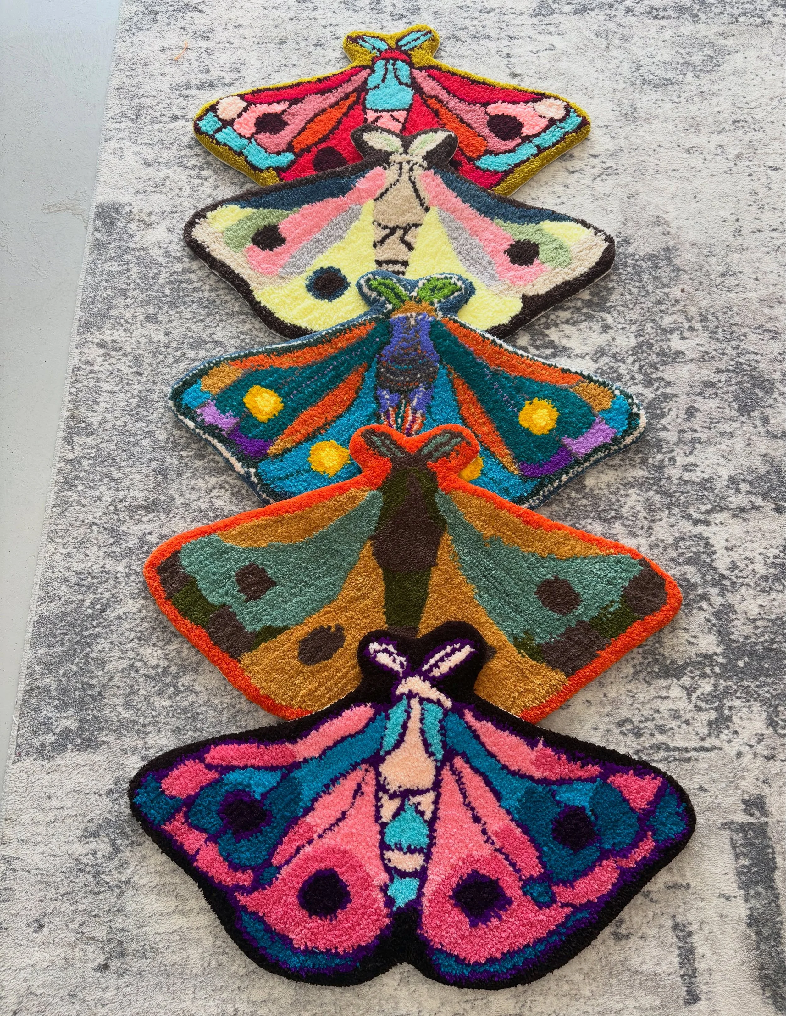 Absolutely beautiful work!!! 😍🦋 The birthday girl had the sweetest idea&mdash;everyone made the same moth rug! Now all these gorgeous creations will be displayed together on her bedroom wall! What a special way to remember her birthday! 💕🧶

#func