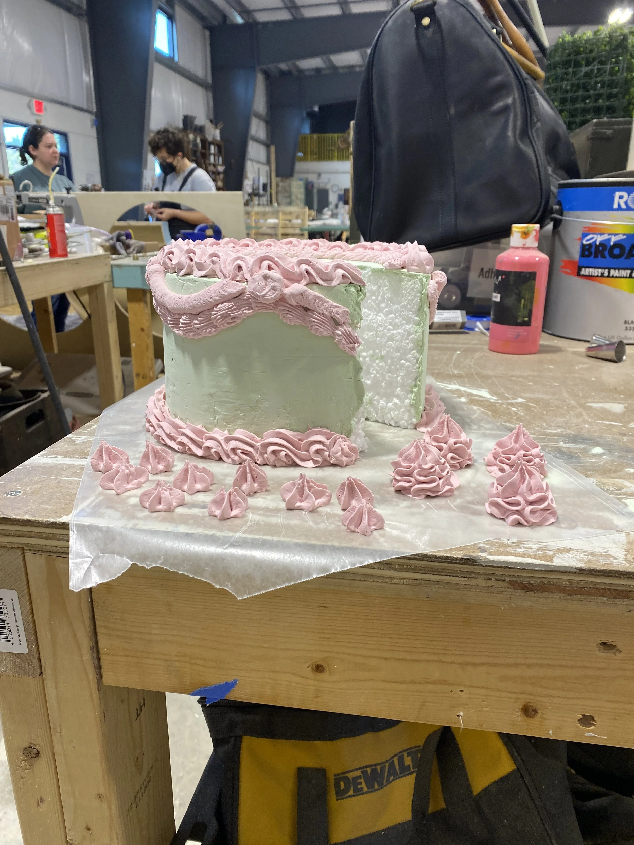 From there I mixed up other colors and used the piping tips we had to decorate the cake