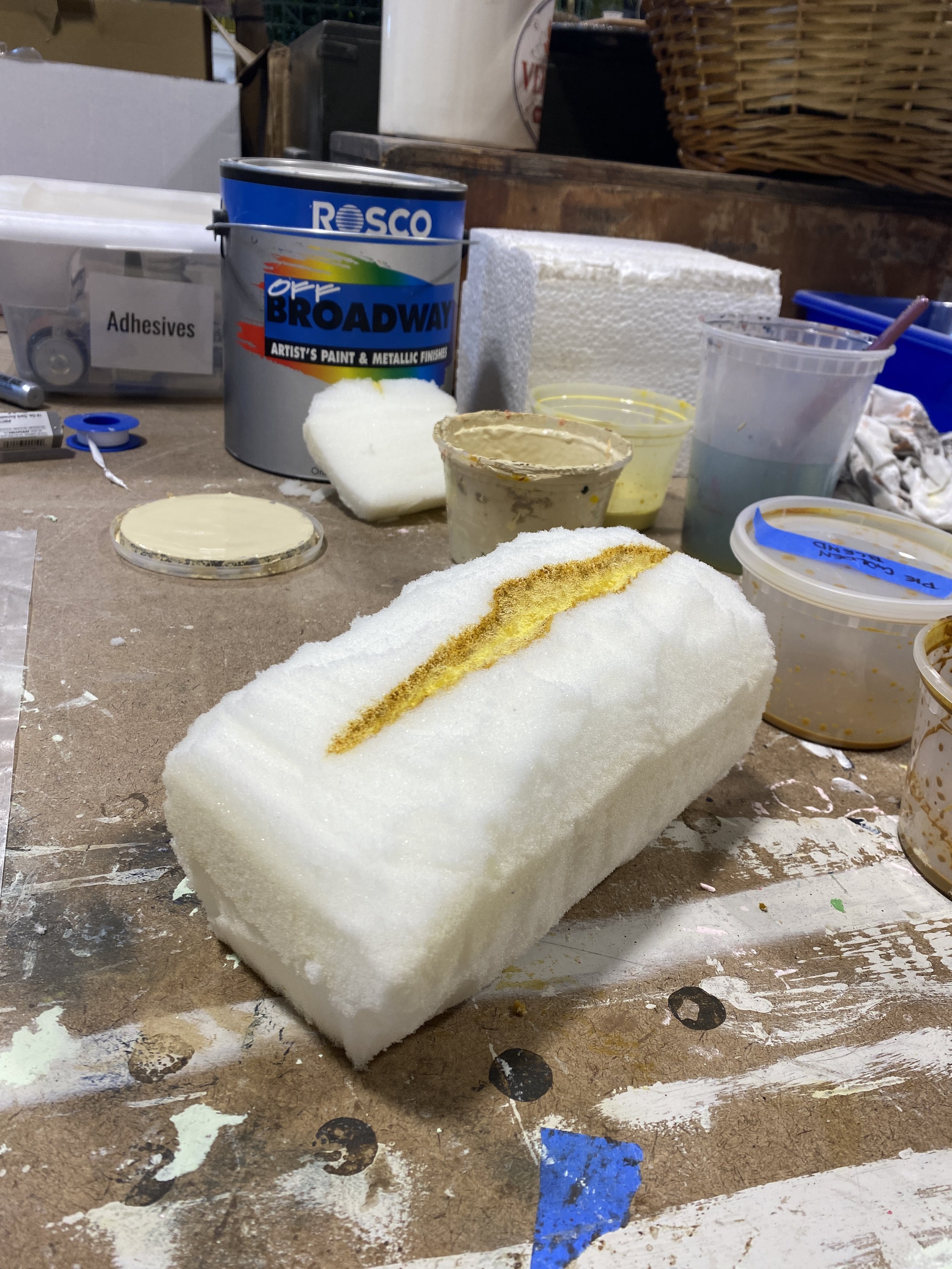 After carving I began to add details and paint with hand mixed acrylics that I turned into washes