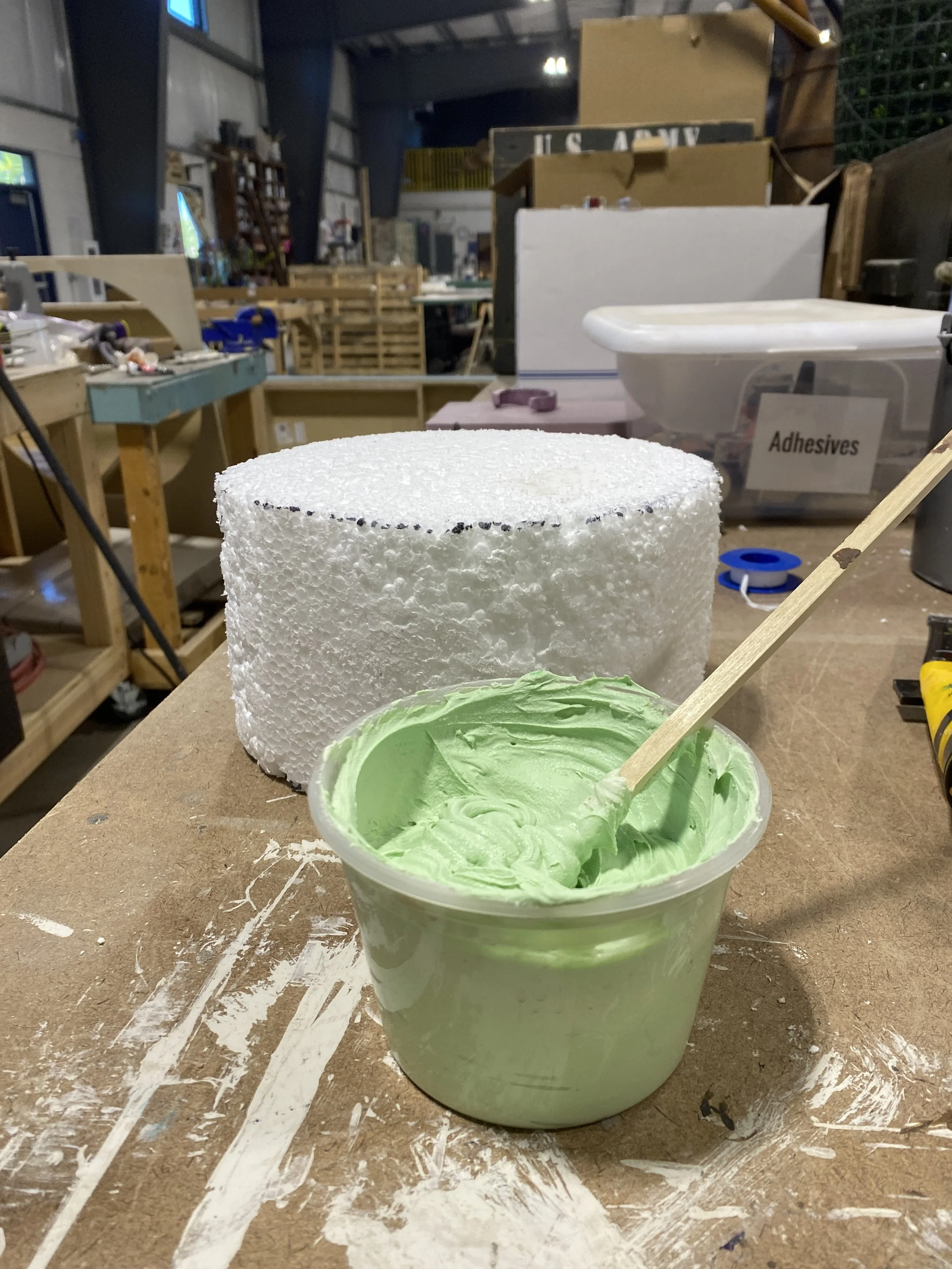 Once carved I used joint compound and acrylic paint to create the frosting 