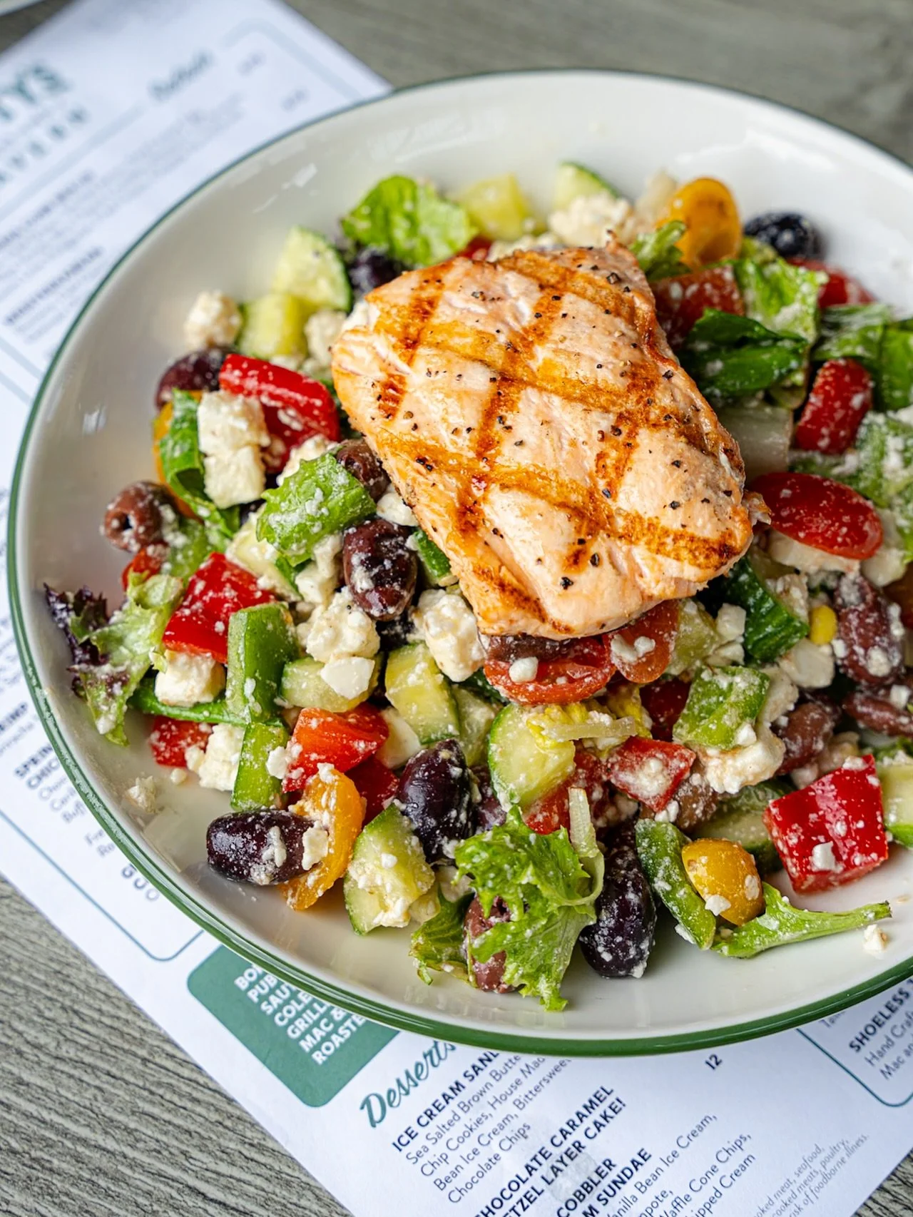 Kick off the weekend with our Mediterranean Salmon Salad 🥗 crisp greens, feta, olives, and a touch of red wine vinaigrette. 🏈 Then catch Lefty&rsquo;s Big Screen weekend games. See the story for the full lineup!
