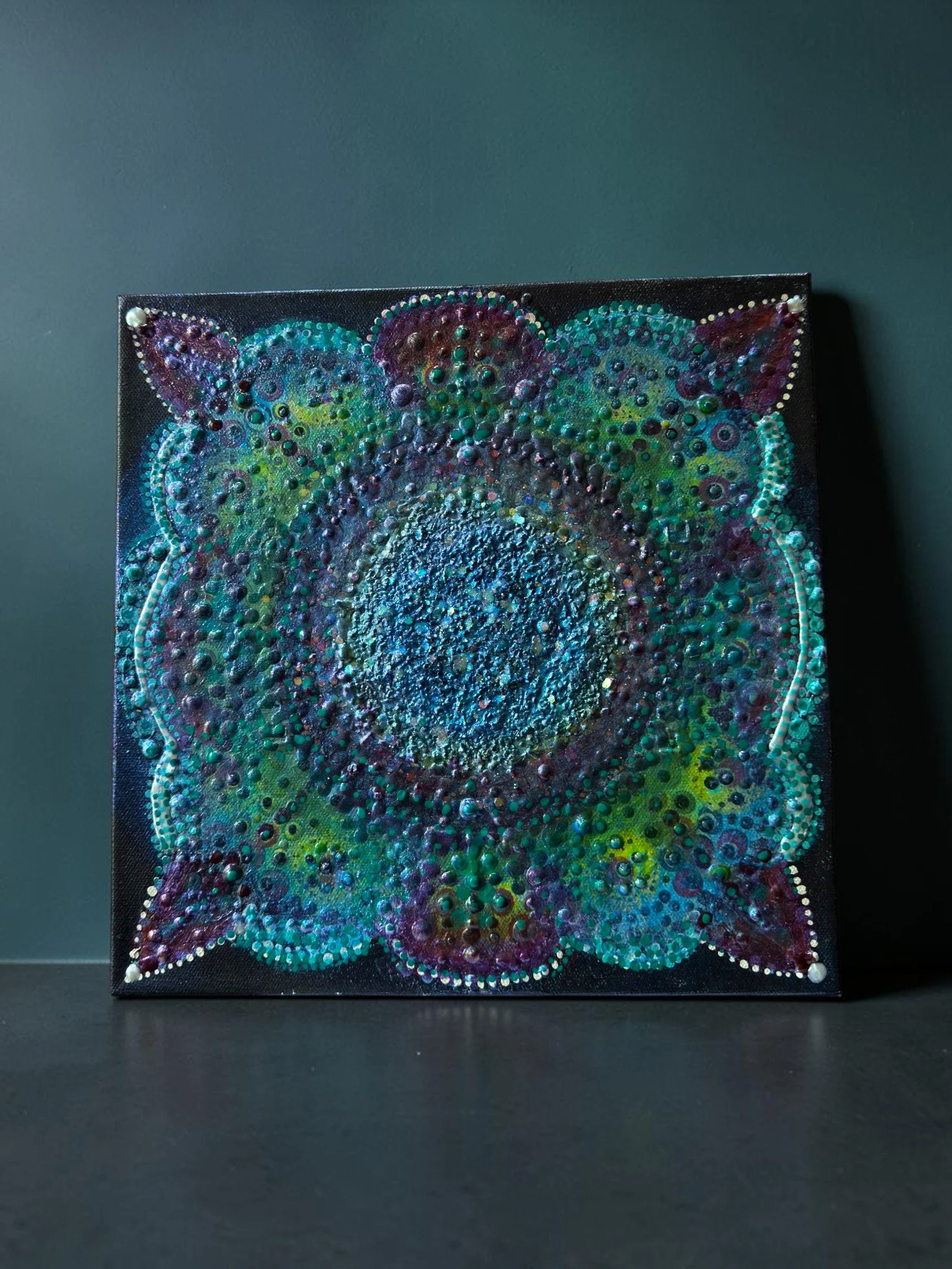 UV Reactive Mandala art with blue and purple glowing dots and circles, text 'Color Cult' in neon yellow font at the bottom, decorative gold frame outline.