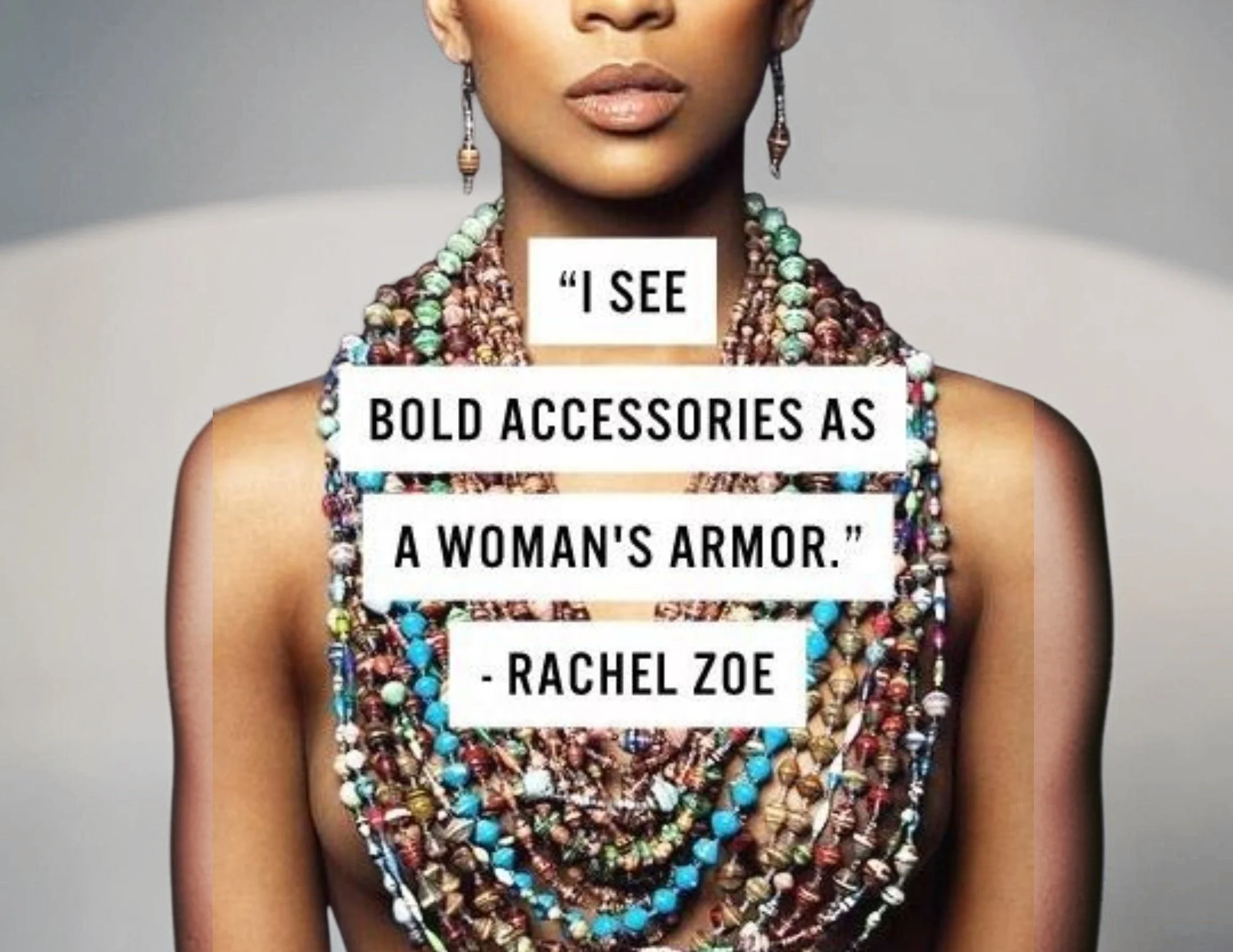 A woman wearing multiple colorful necklaces and earrings, with a quote overlay that reads 'I see bold accessories as a woman's armor,' attributed to Rachel Zoe.