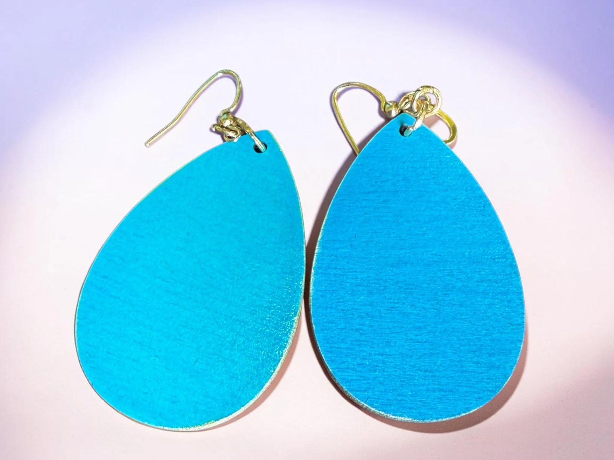 Aqua Heart of Gold Embossed Teardrop Earrings by Color Cult