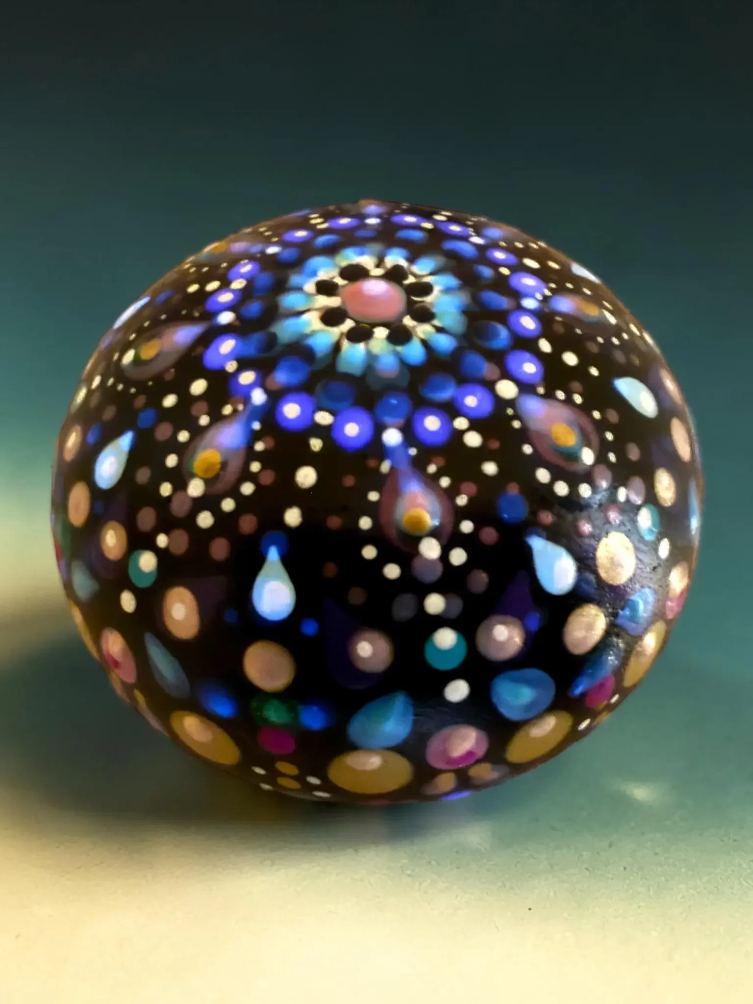 Dumpling Mandala Stone by Color Cult featuring glow in the dark effects.