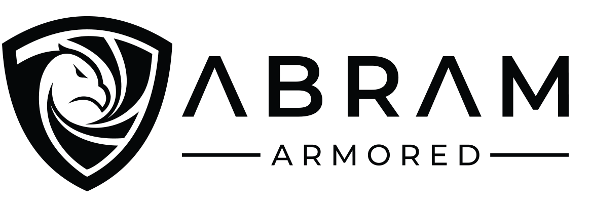 Logo of Abram Armored featuring a stylized shield with a lion head and the text "ABRAM ARMORED."