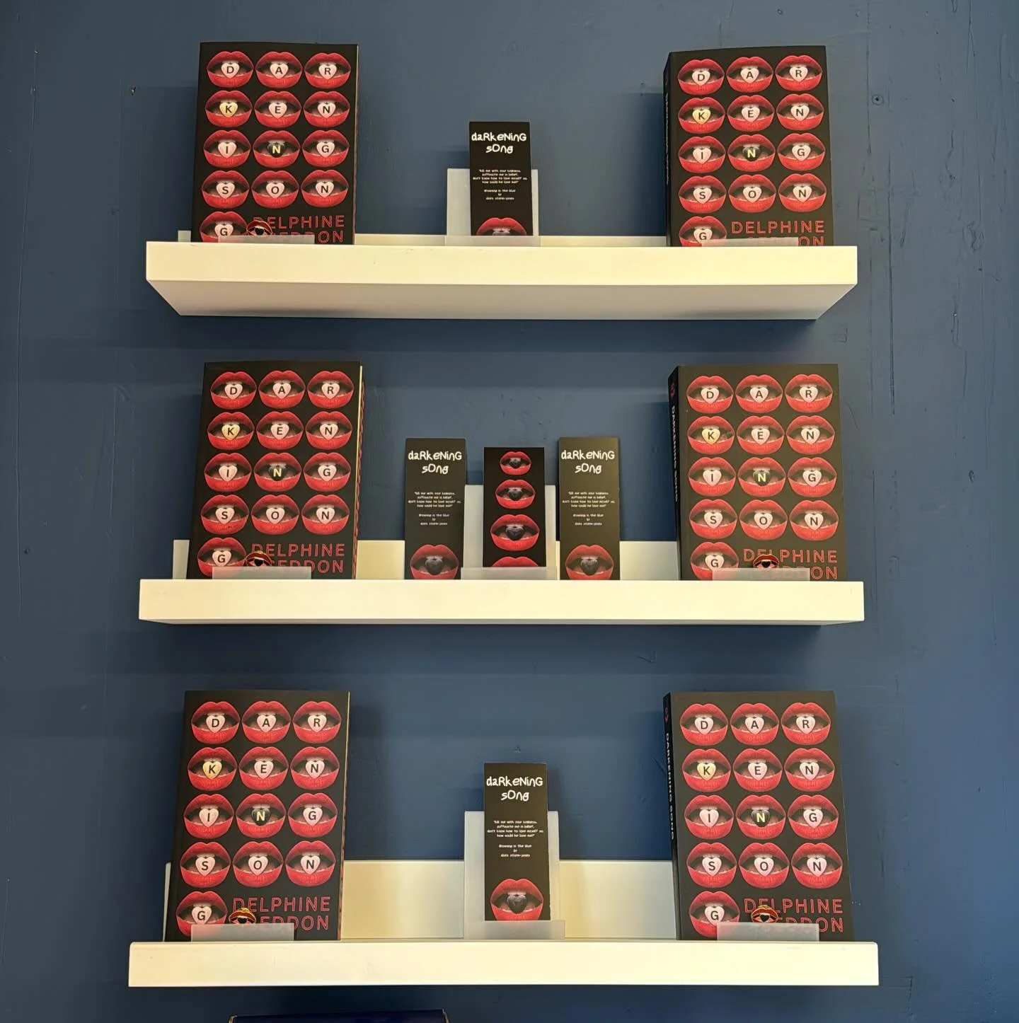 A day late&hellip; but happy publication day to @delphineseddon!

Darkening Song is now available in Books &amp; Bevs! We have 5 special edition sprayed edge copies available in store that include a bookmark and a very special pin badge too!

Think D