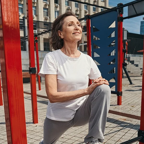 _0005_happy-elderly-woman-training-body-in-city-centre-2024-10-21-11-16-08-utc.jpg