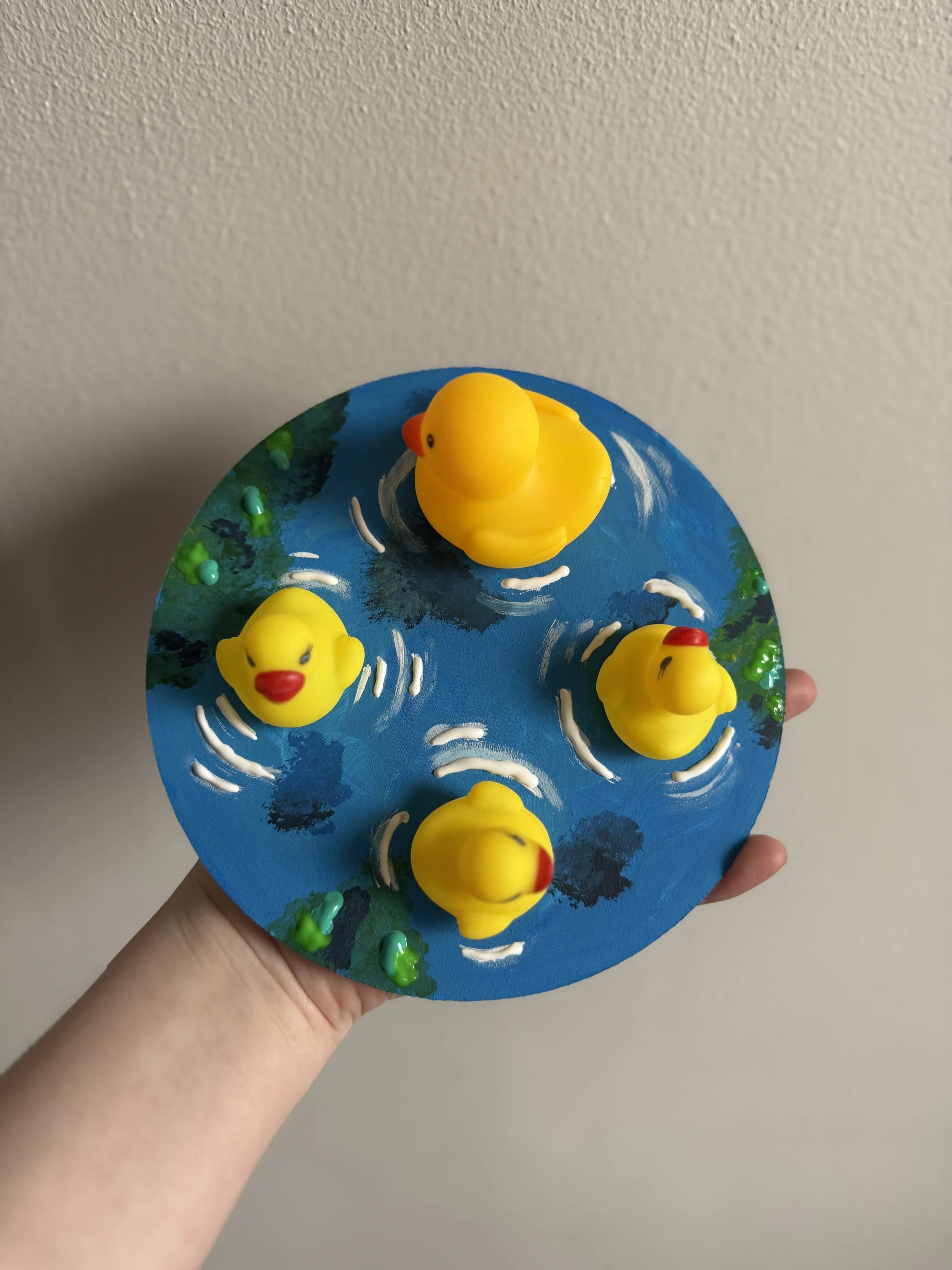 Ducks Together in a Pond